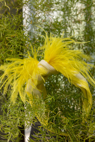 Диадема в жълто от флорална органза с пера